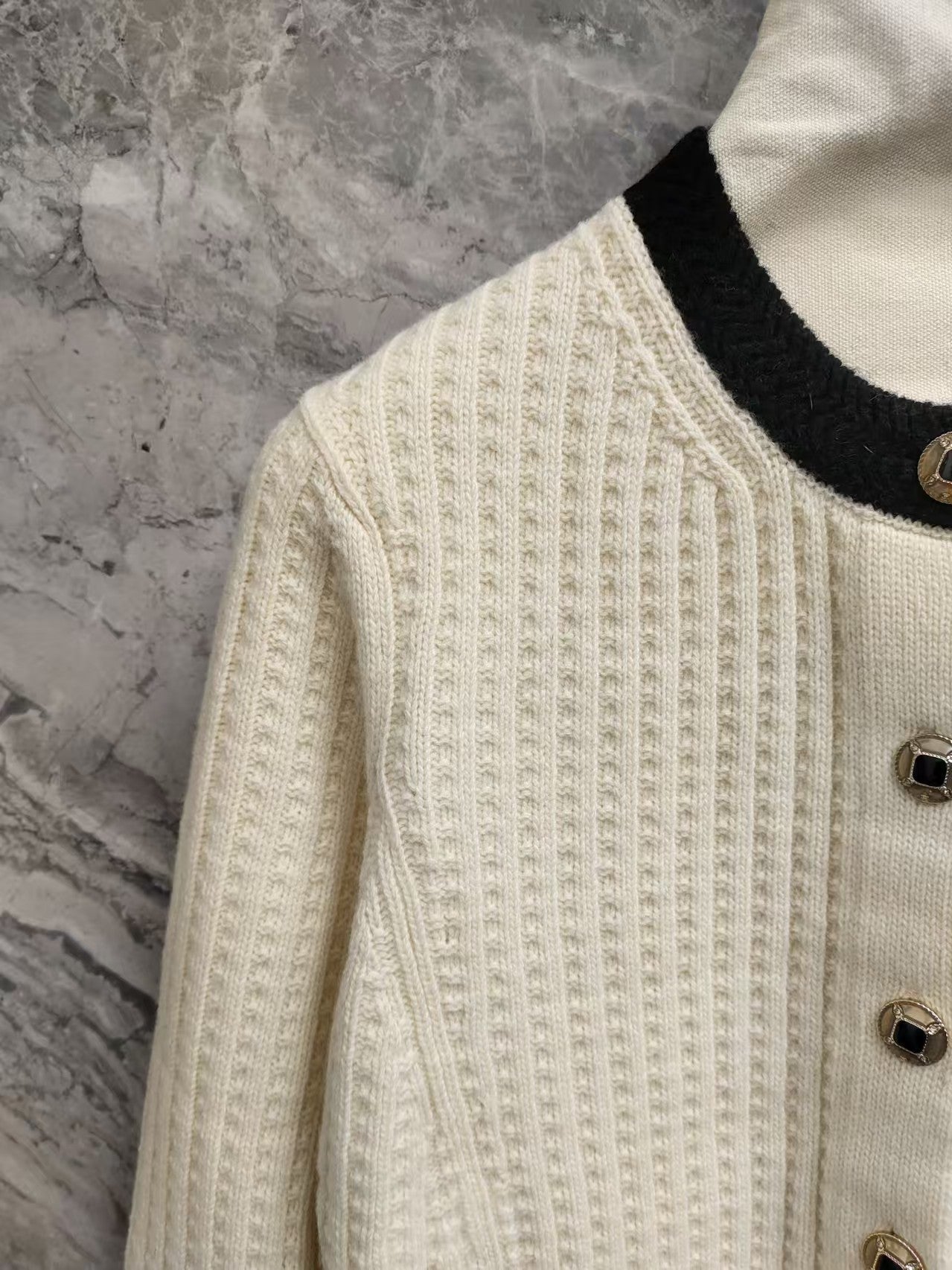 Black and white color-blocked wool knit cardigan