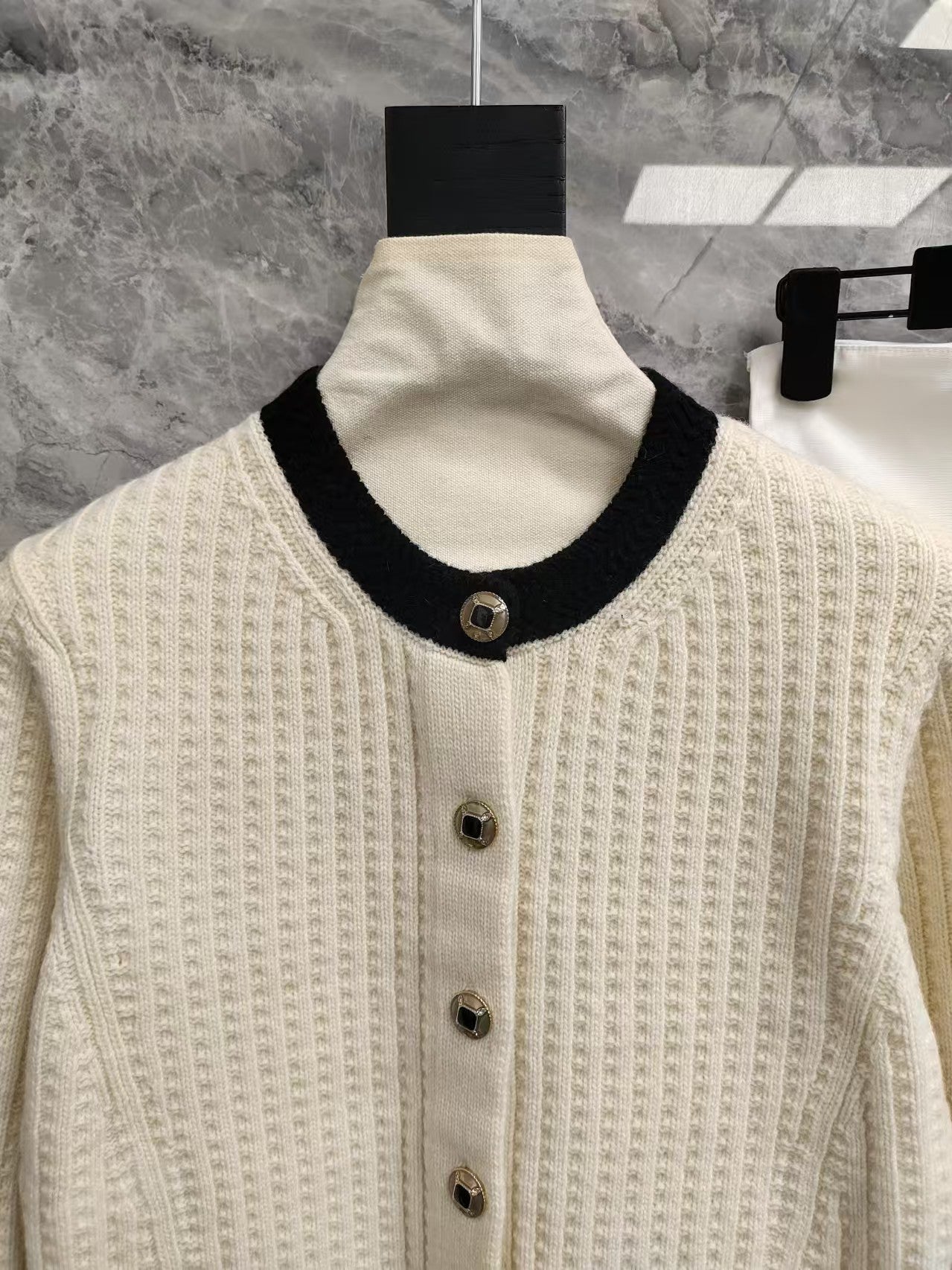 Black and white color-blocked wool knit cardigan