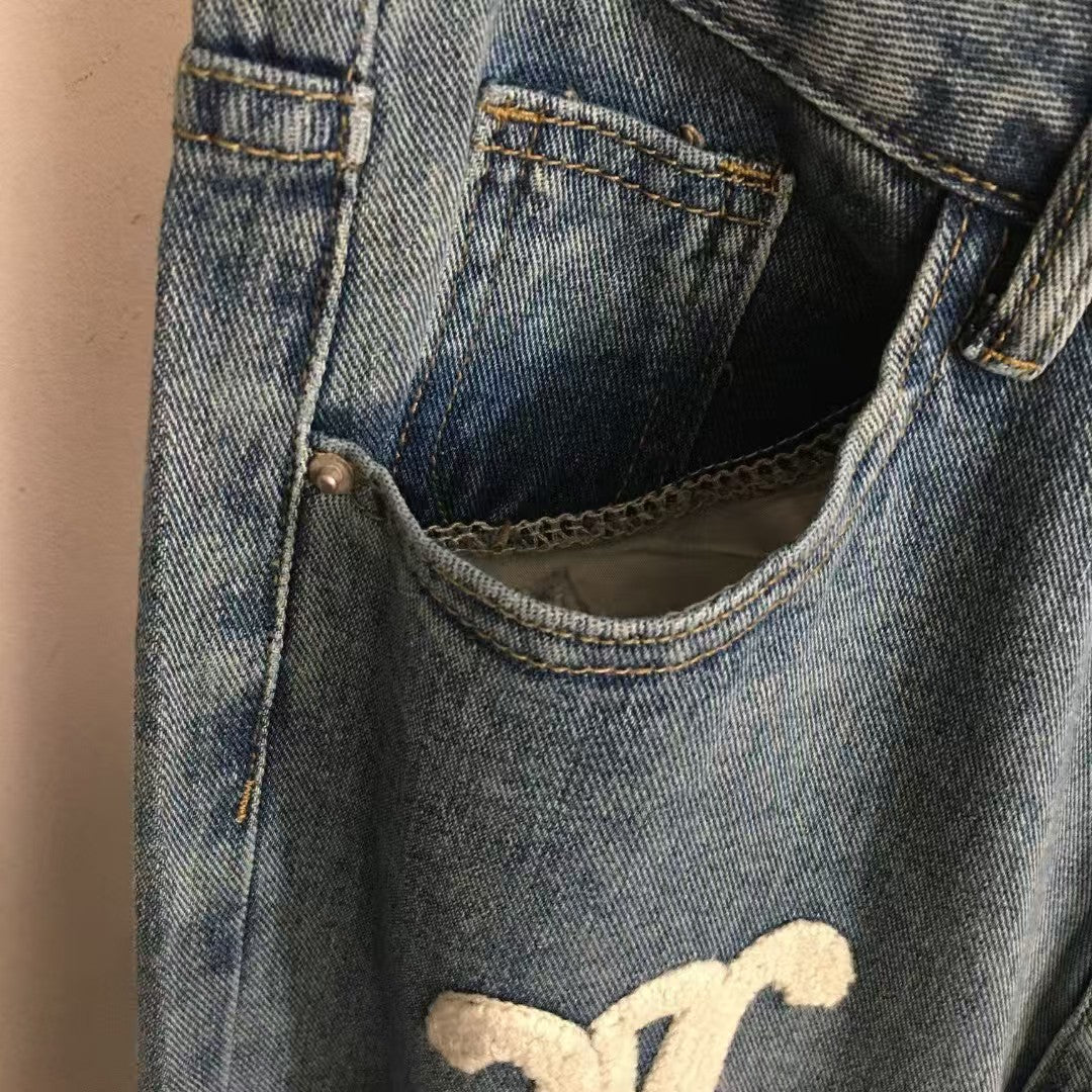 Flocked logo embroidered jeans