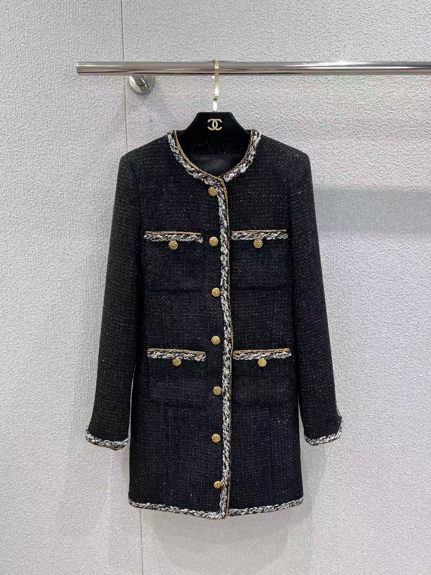 Black and gold four-pocket tweed coat