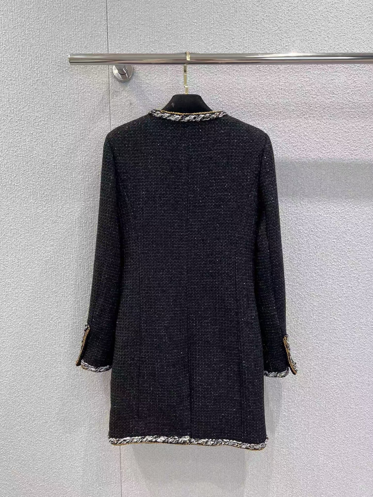 Black and gold four-pocket tweed coat