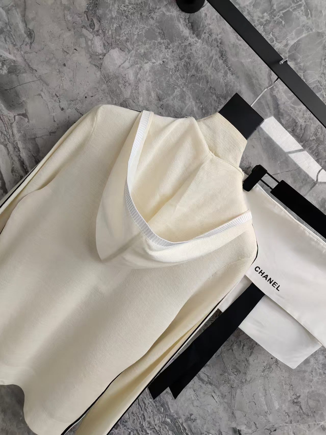 Black and white zip-up hooded cardigan