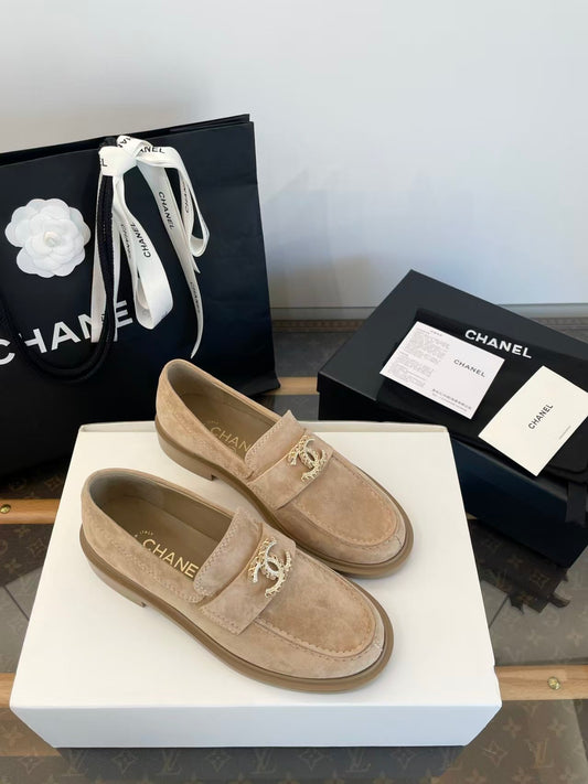 Gold buckle suede loafers