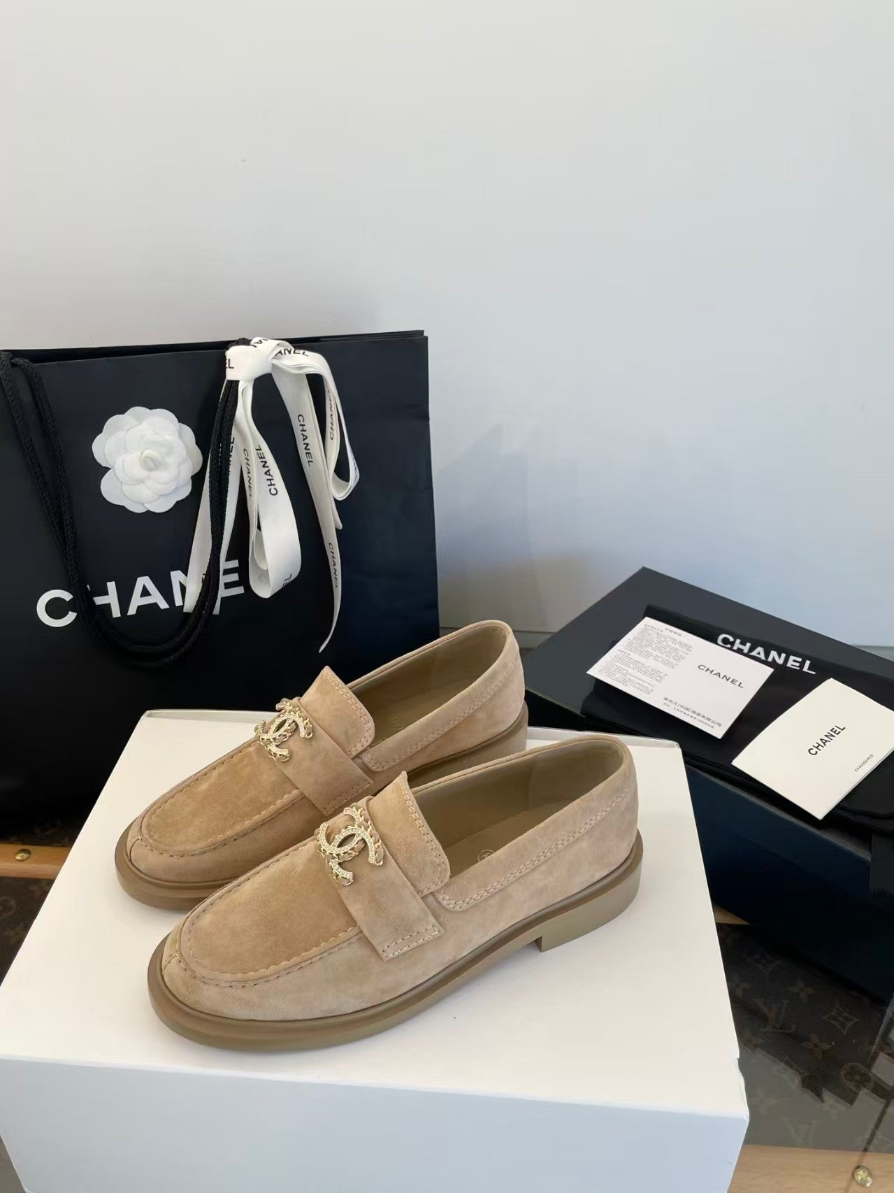 Gold buckle suede loafers