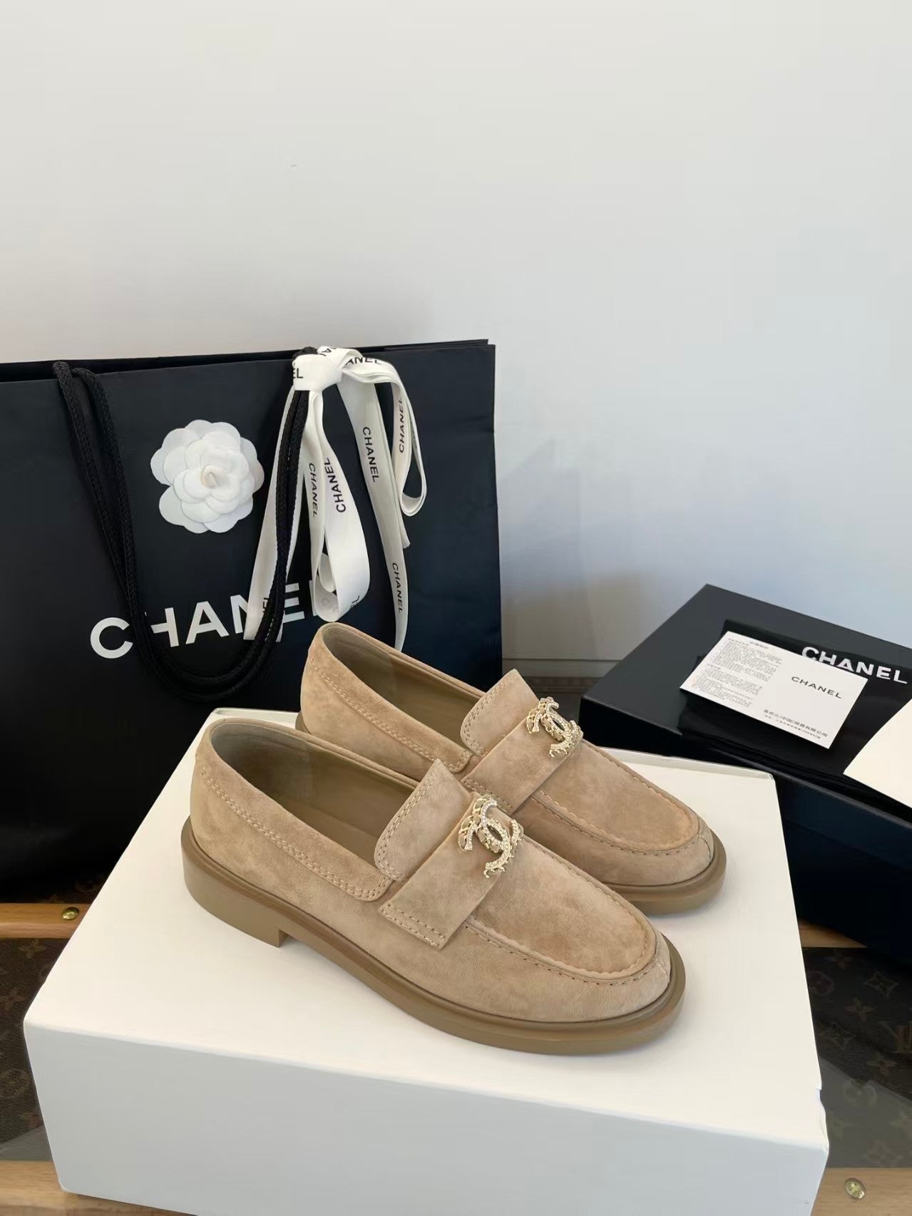 Gold buckle suede loafers