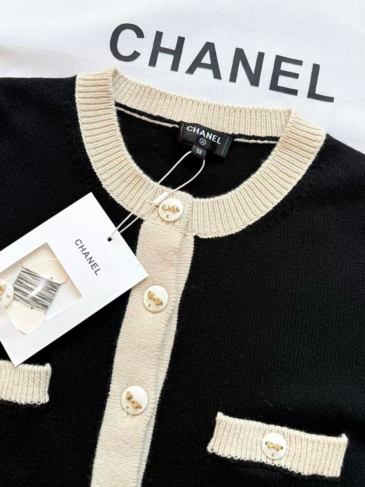 Bow-tie button-down cardigan