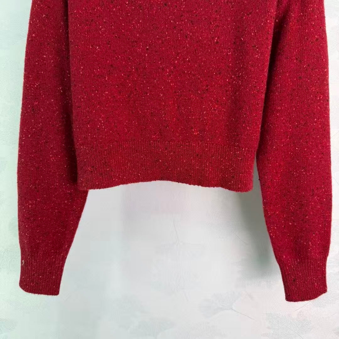 Stand-up collar triangular logo sweater