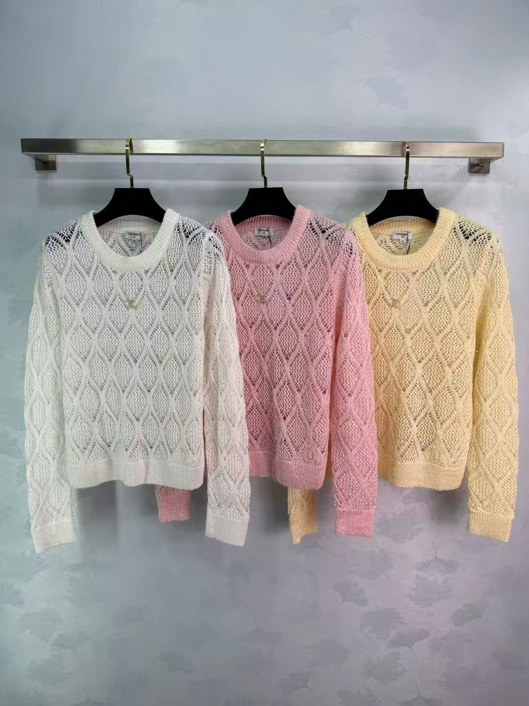 Sequined diamond-patterned openwork pullover knit sweater