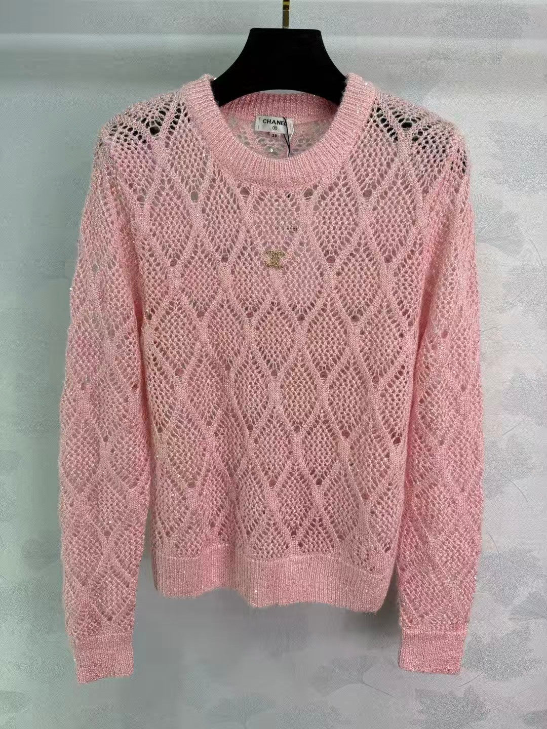 Sequined diamond-patterned openwork pullover knit sweater