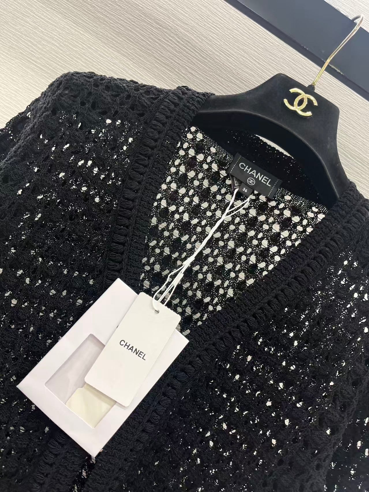 Openwork short-sleeved knitted cardigan