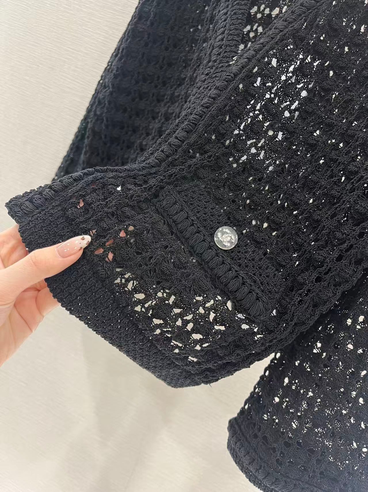 Openwork short-sleeved knitted cardigan