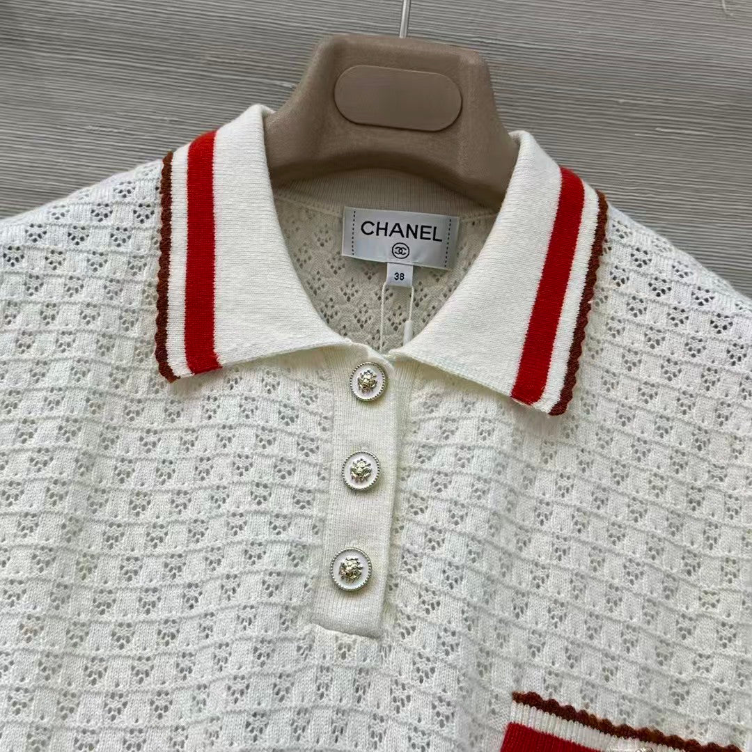 Retro-style polo shirt with cut-out details.