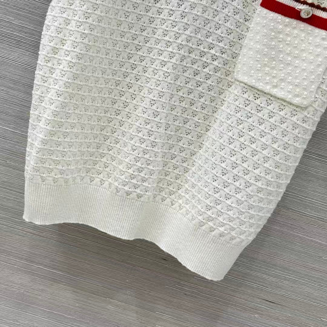 Retro-style polo shirt with cut-out details.