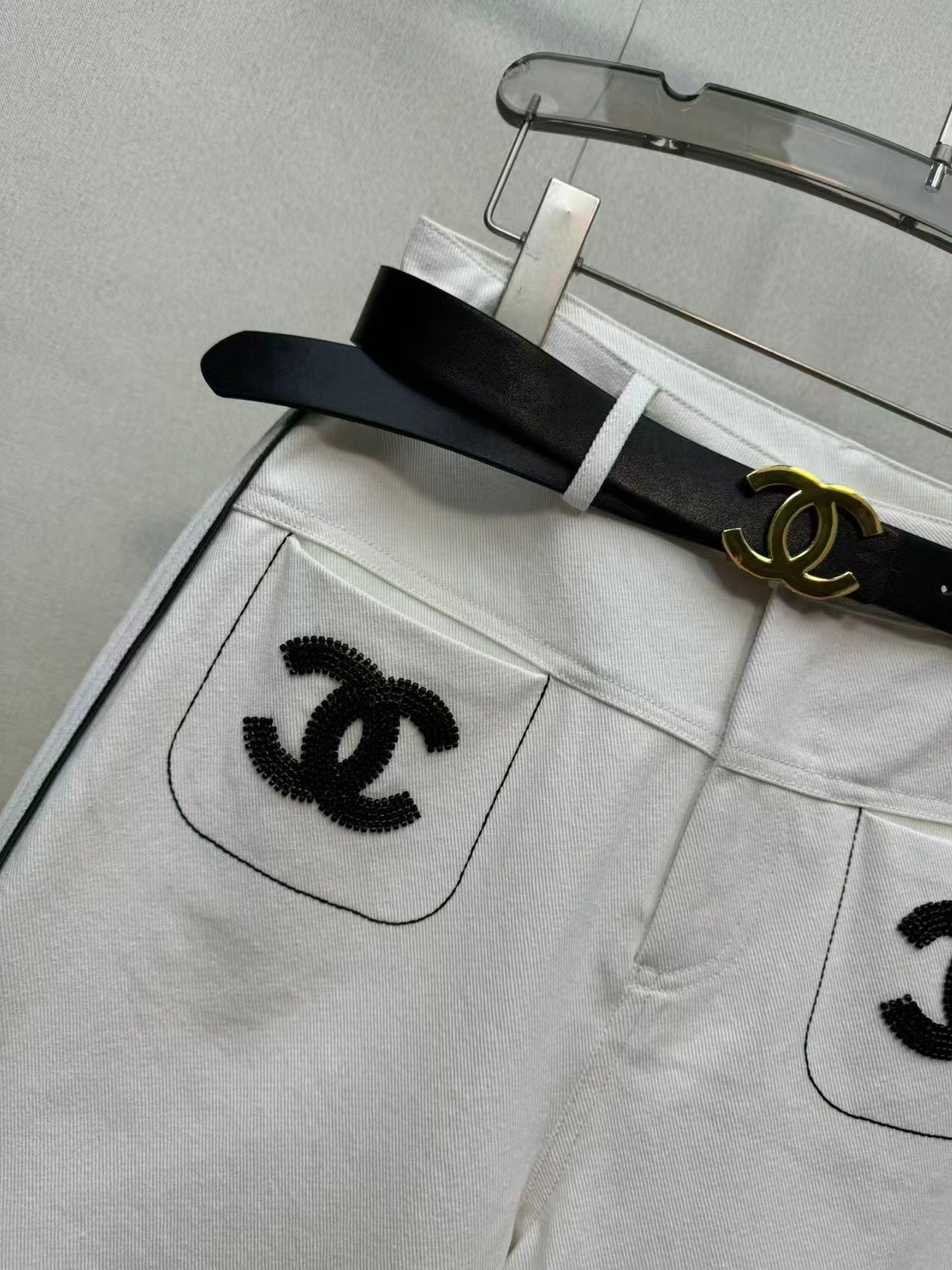 New double-C white denim jeans