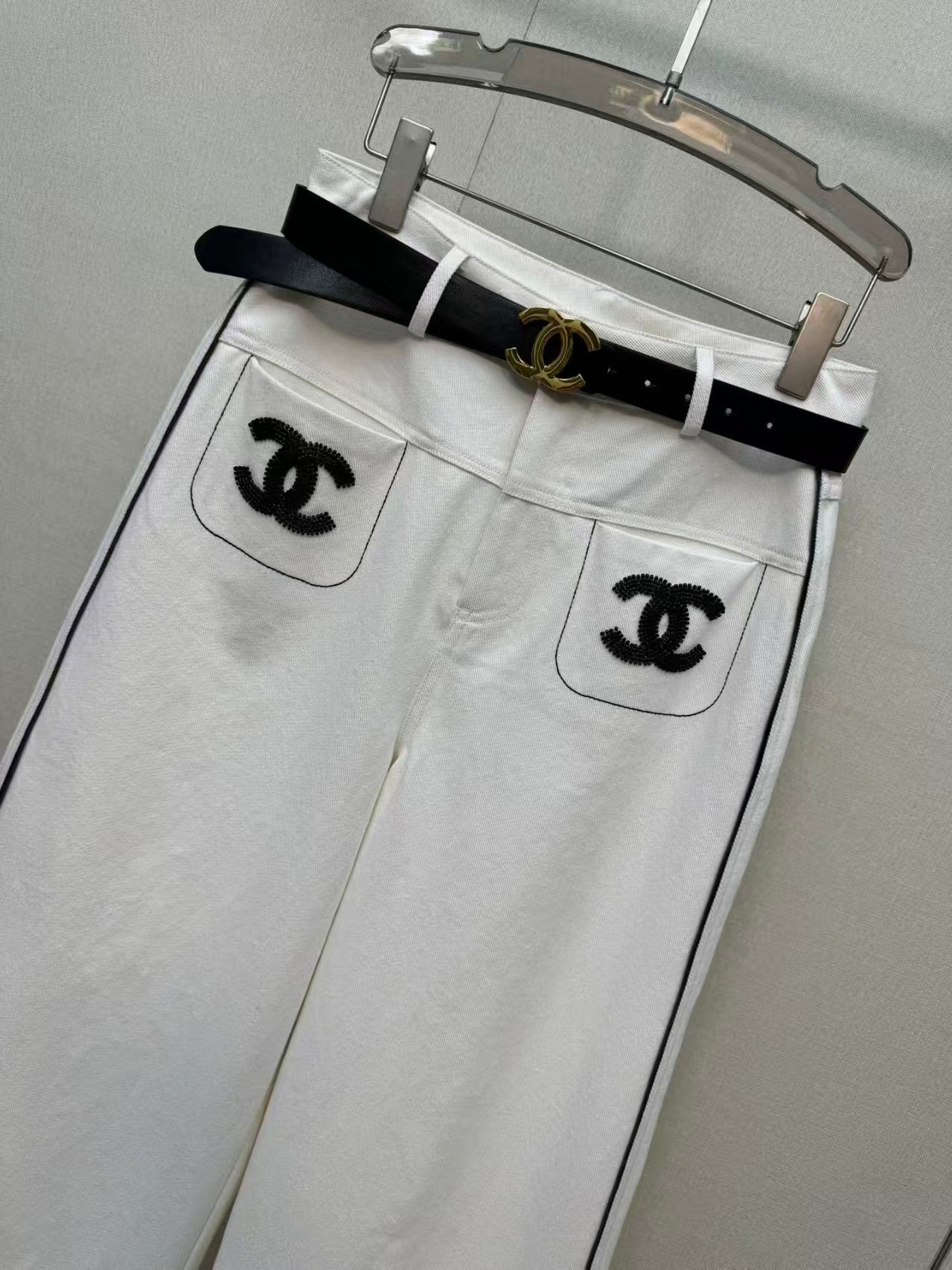 New double-C white denim jeans