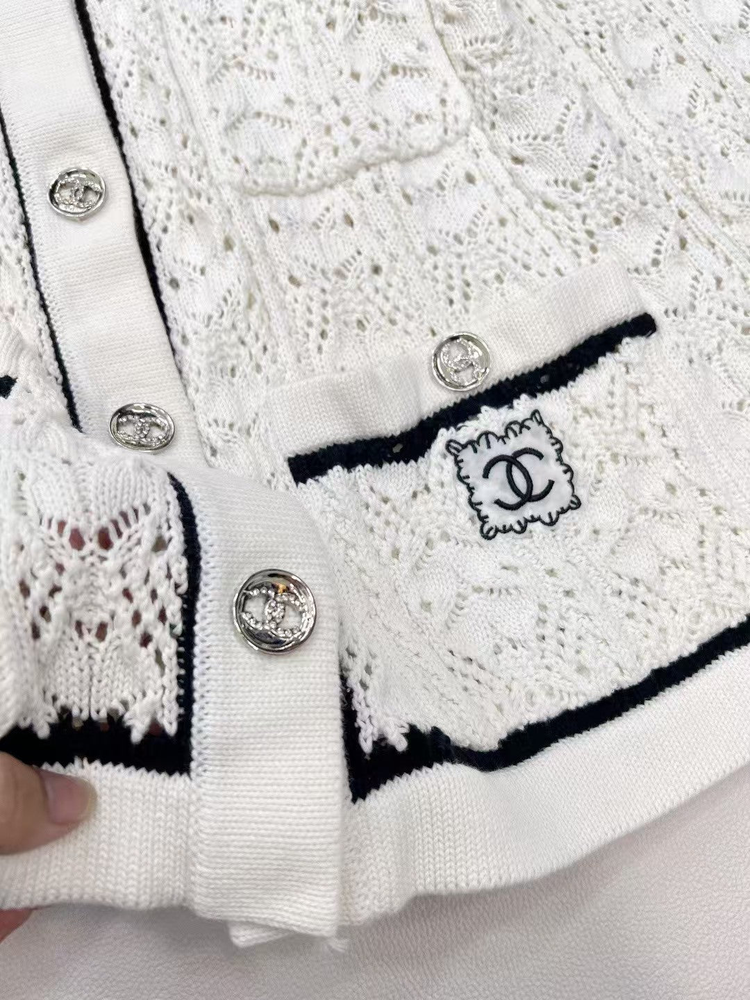 26SS openwork pocket embroidered logo knit sweater