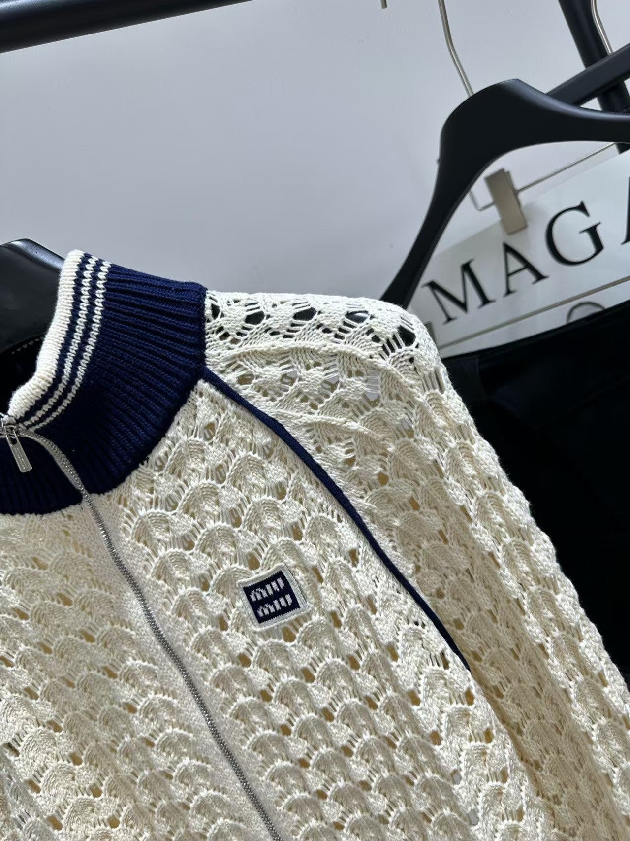 26SS Beige Badge Stand Collar Hollow-Out Cardigan