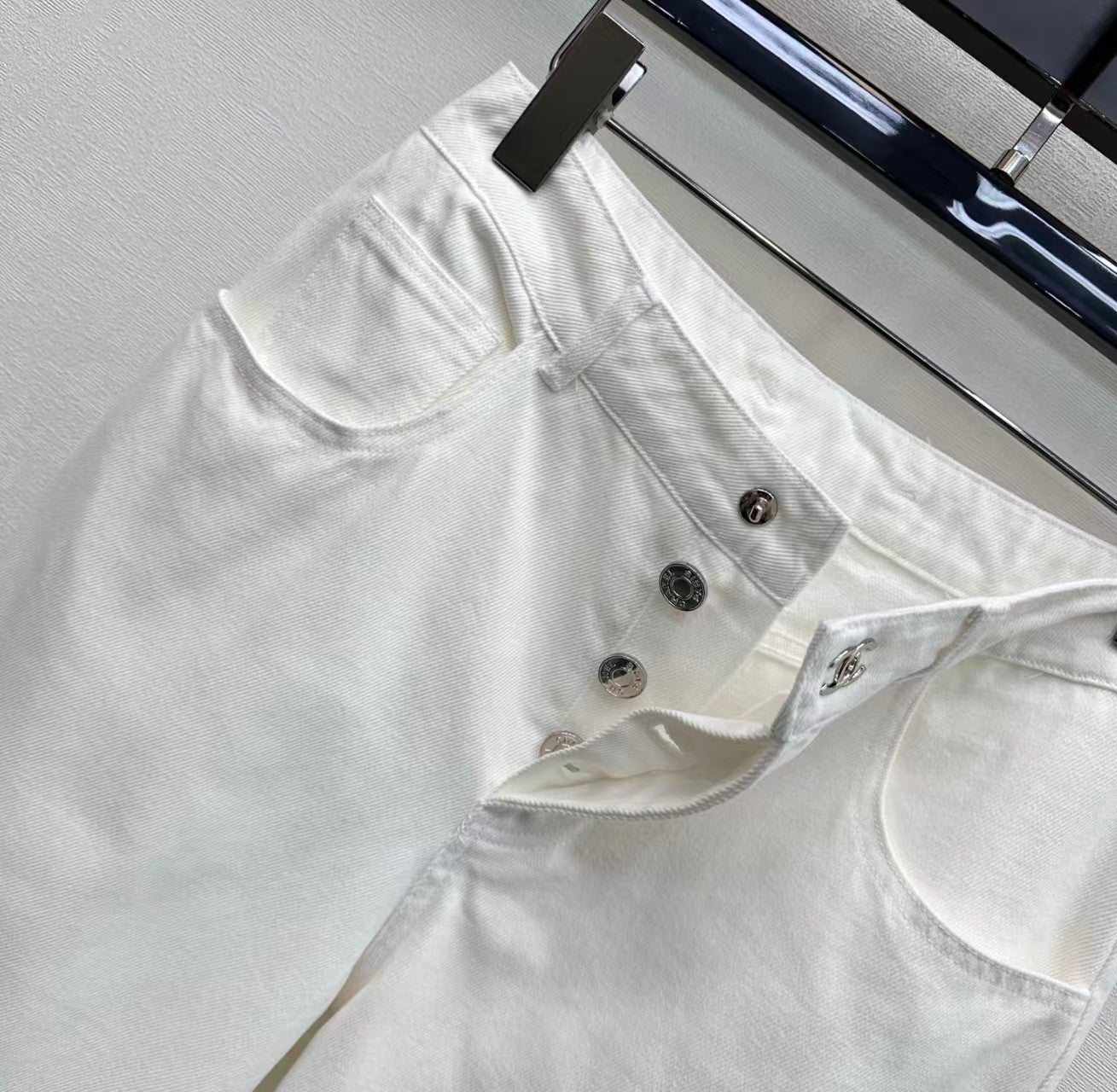 26SS Embroidered Denim Trousers with Schoolbag-Style Buckles