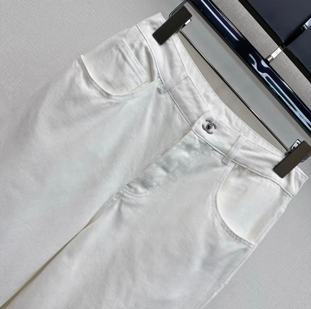 26SS Embroidered Denim Trousers with Schoolbag-Style Buckles