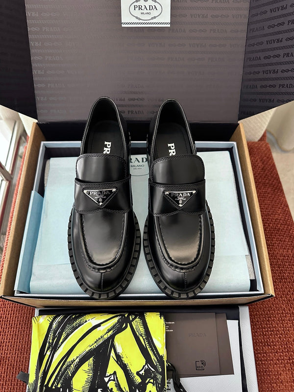 Classic Triangle Logo Patent Leather Loafers