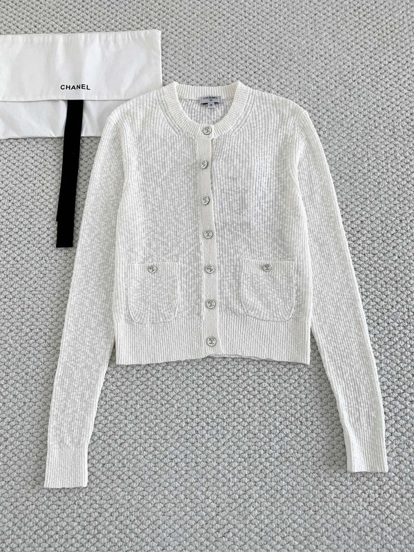 25 new beach particle texture long sleeved round neck knitted cardigan