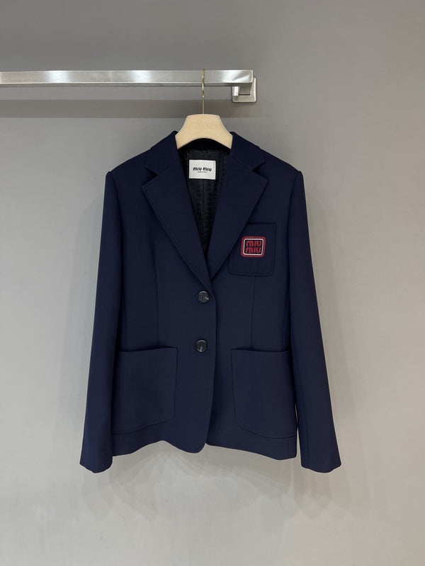 Embroidered logo with letters, printed inside suit jacket