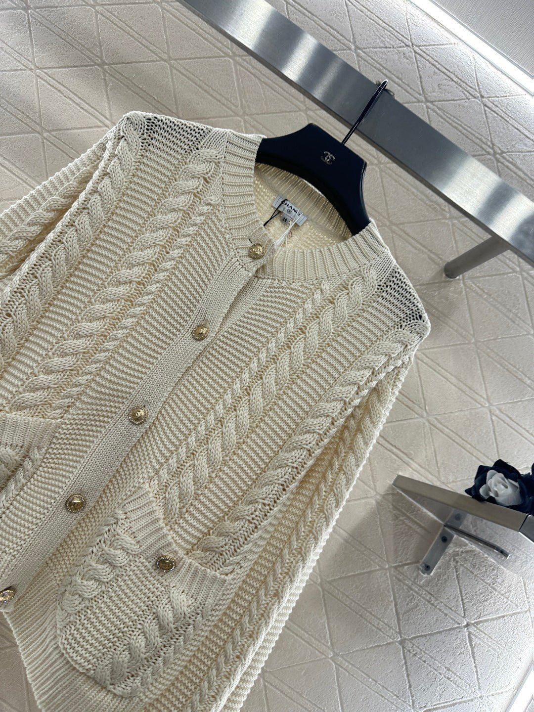 Round-neck cable knit cardigan