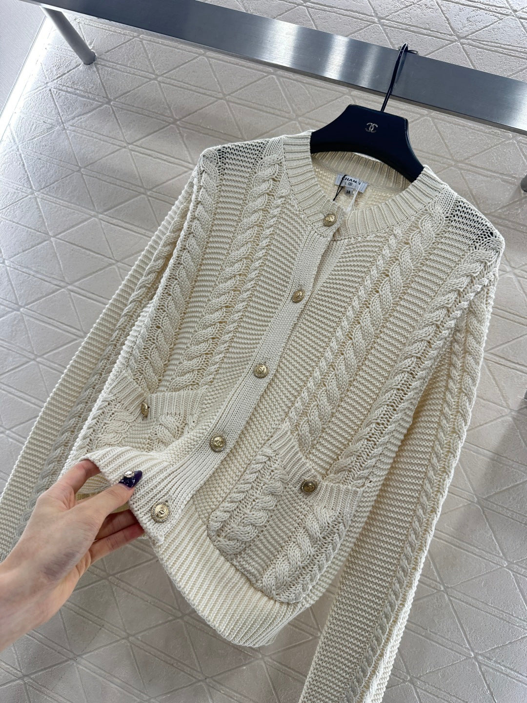Round-neck cable knit cardigan