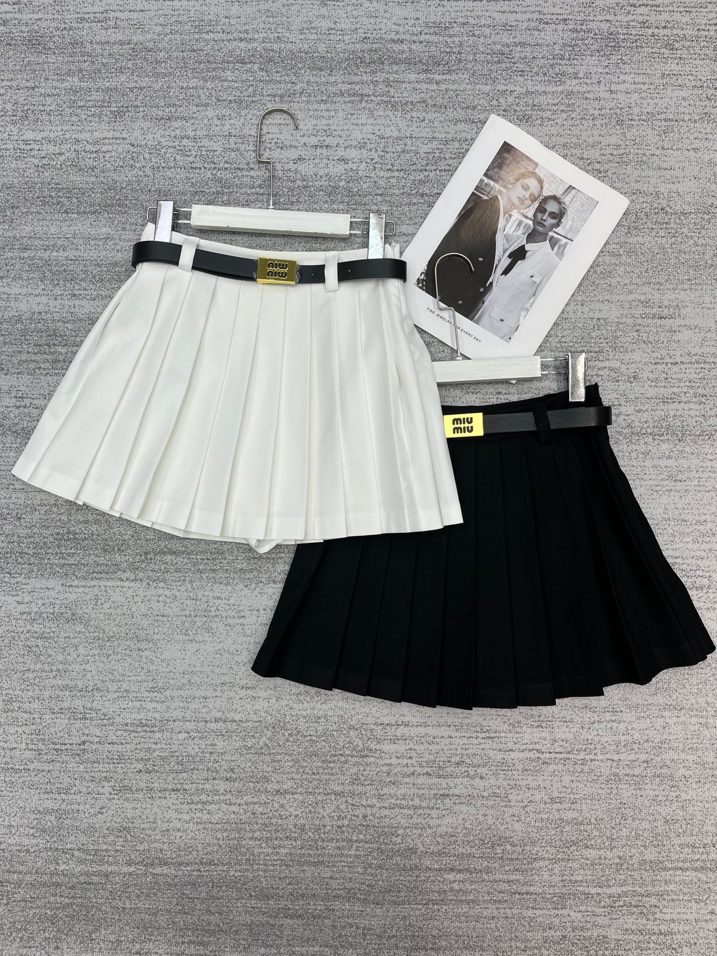 New style pleated skirt with belt.