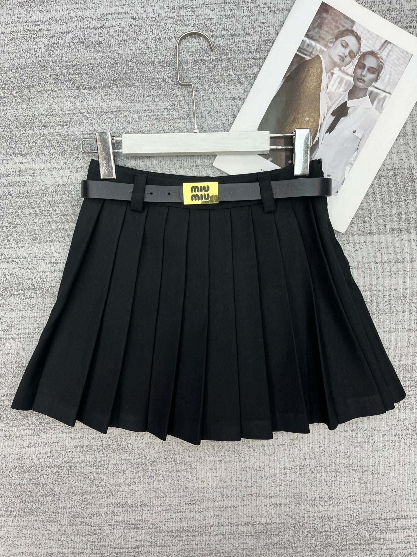 New style pleated skirt with belt.