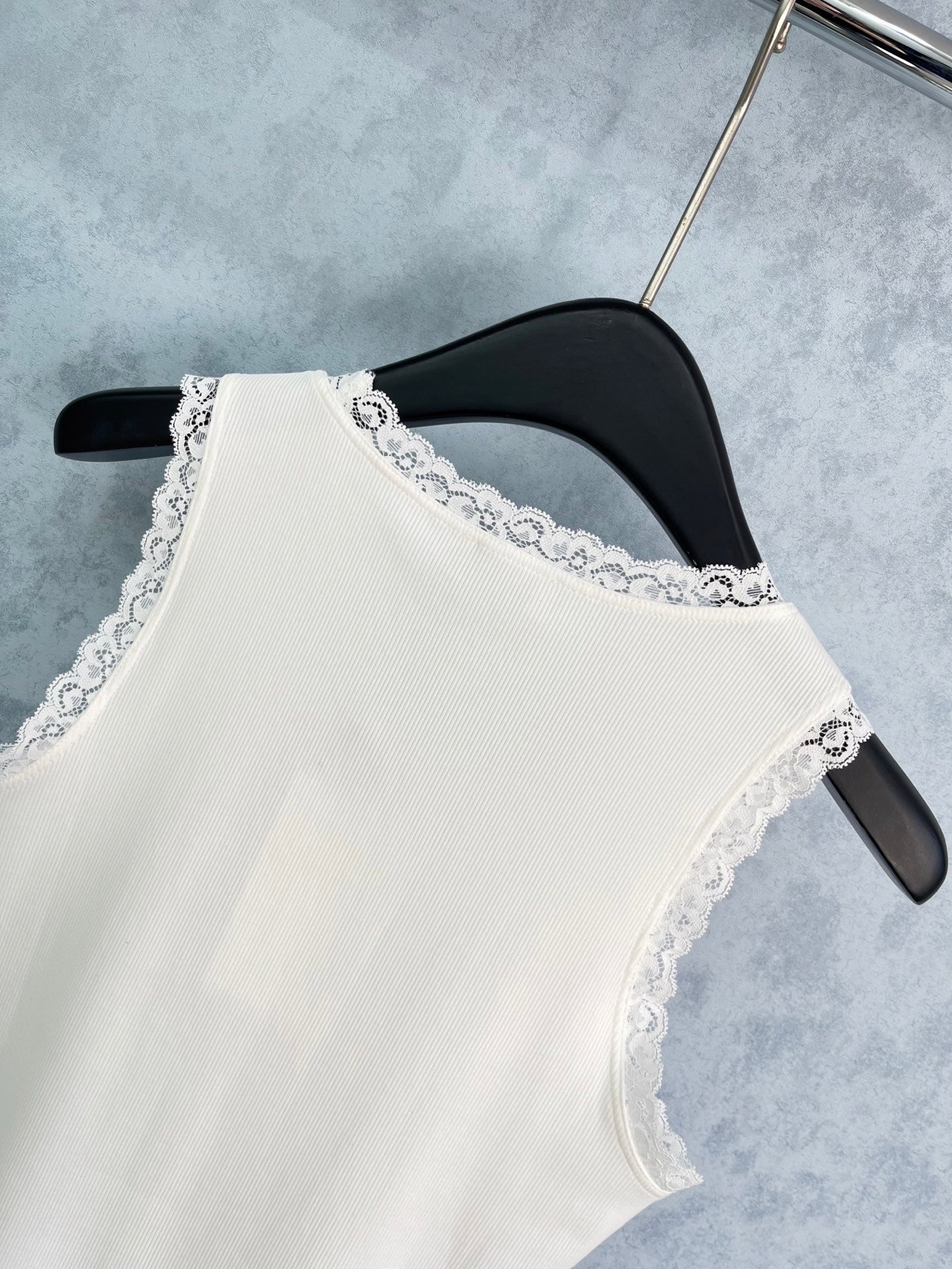 Lace-paneled embroidered vest