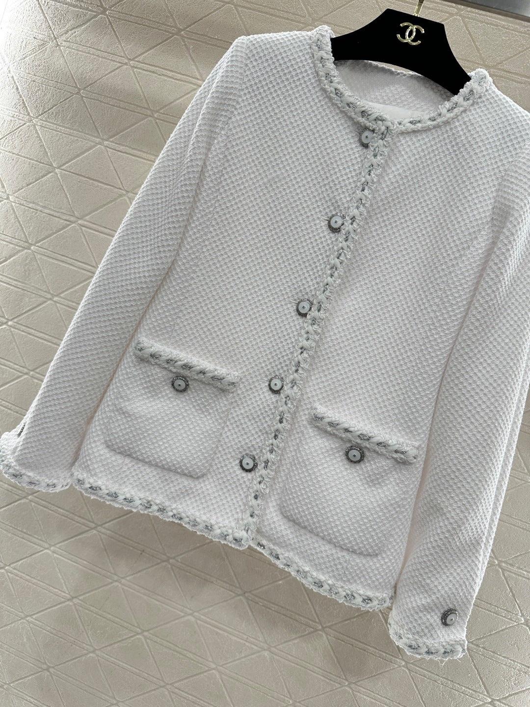 Round-neck jacket with binding trim
