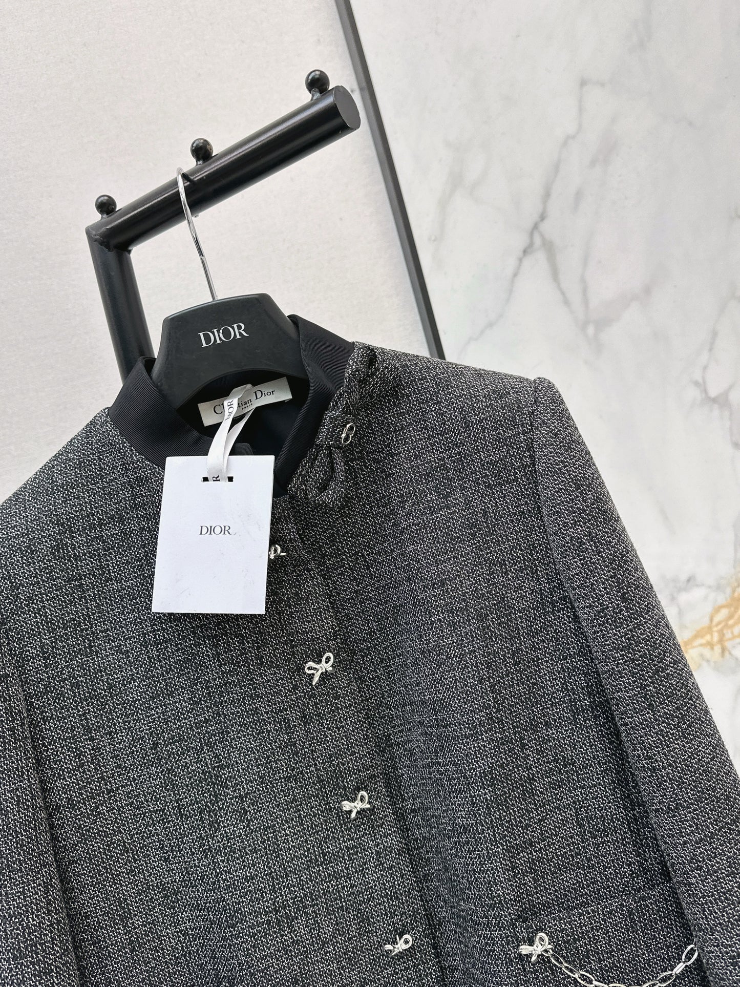 New gray jacket with chain embellishments