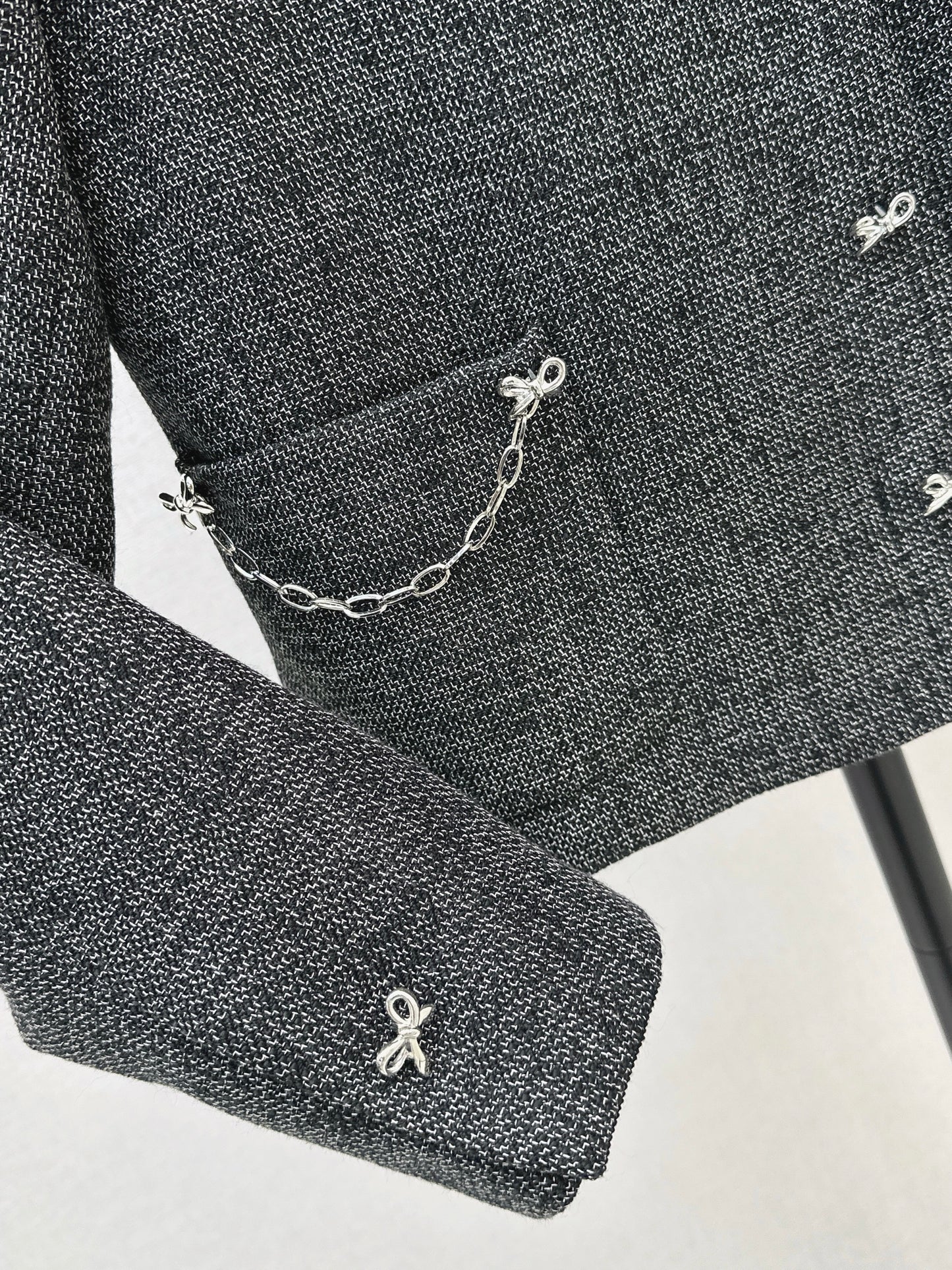 New gray jacket with chain embellishments