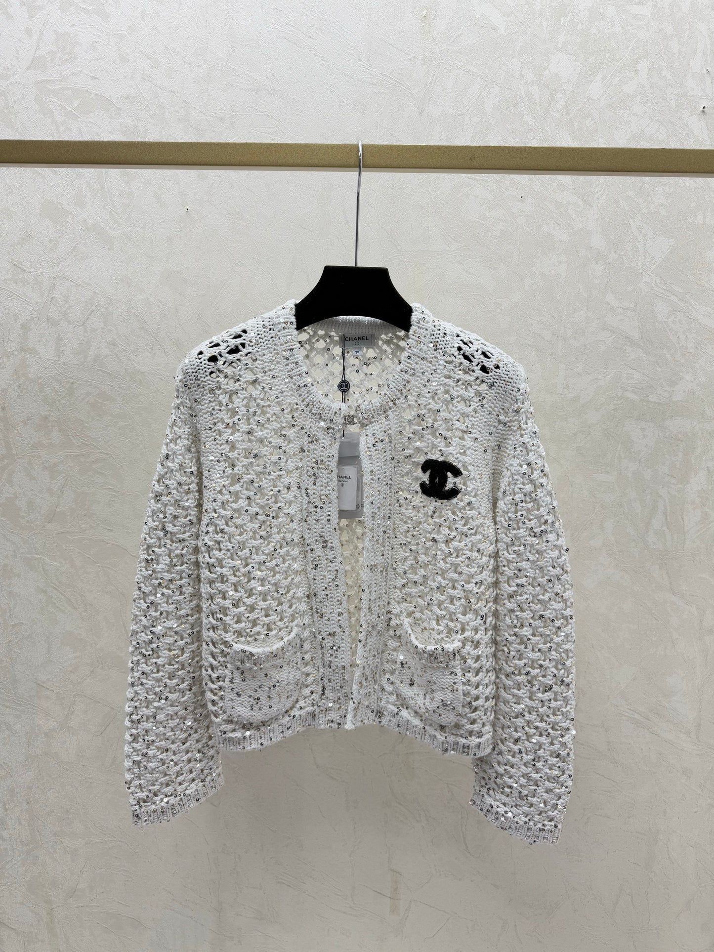 Openwork beaded round-neck knitted cardigan