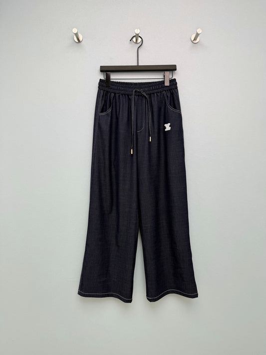26. Wide-Leg Trousers with Side Drawstrings and Exposed Stitching