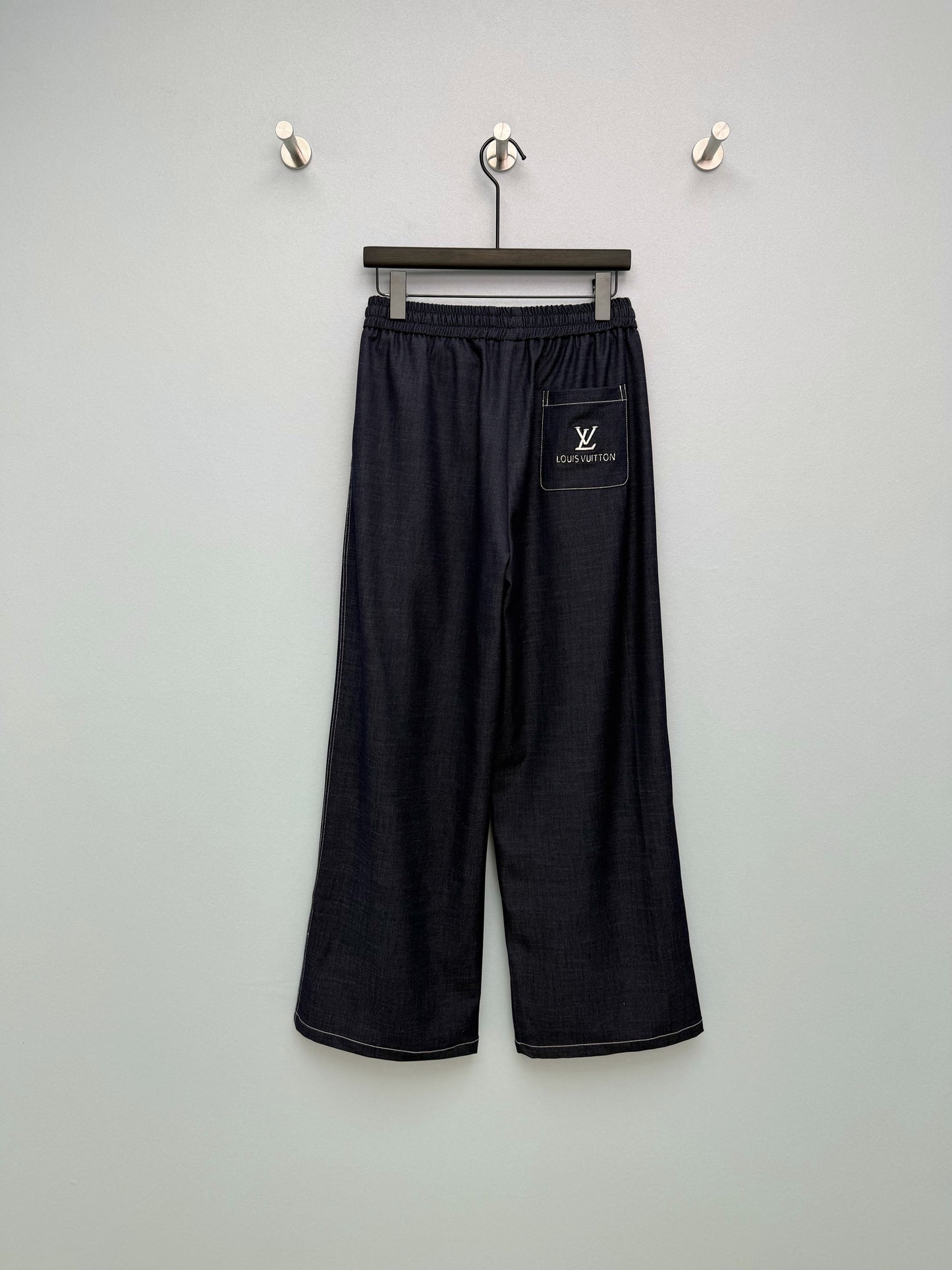 26. Wide-Leg Trousers with Side Drawstrings and Exposed Stitching